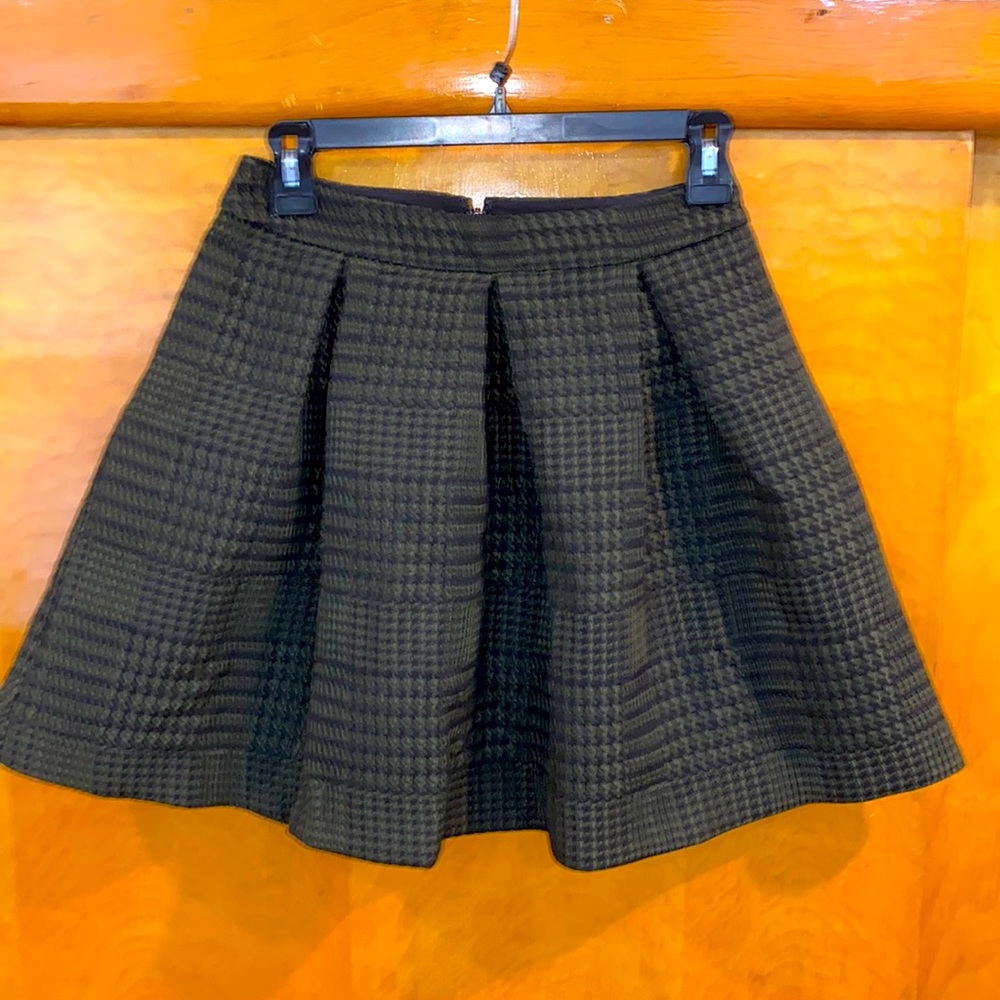 E X P R E S S • Pleated with Structured Skirt